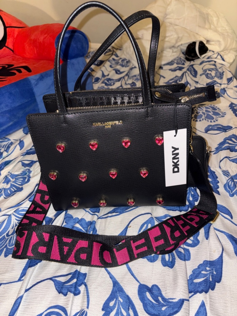DKNY Black Satchel with Pink Heart Studs and Branded Strap
